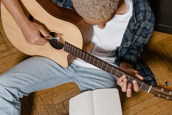 How do Songwriters Fit Lyrics to Music?